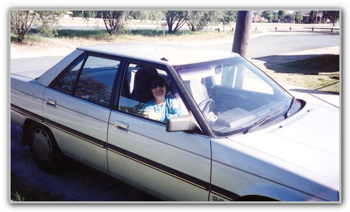 Mum in her car at MJ former house in Morley
